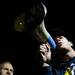 Michigan senior Josh Bartelstein uses a microphone to talk to a large crowd of fans on Sunday, March 31. Daniel Brenner I AnnArbor.com